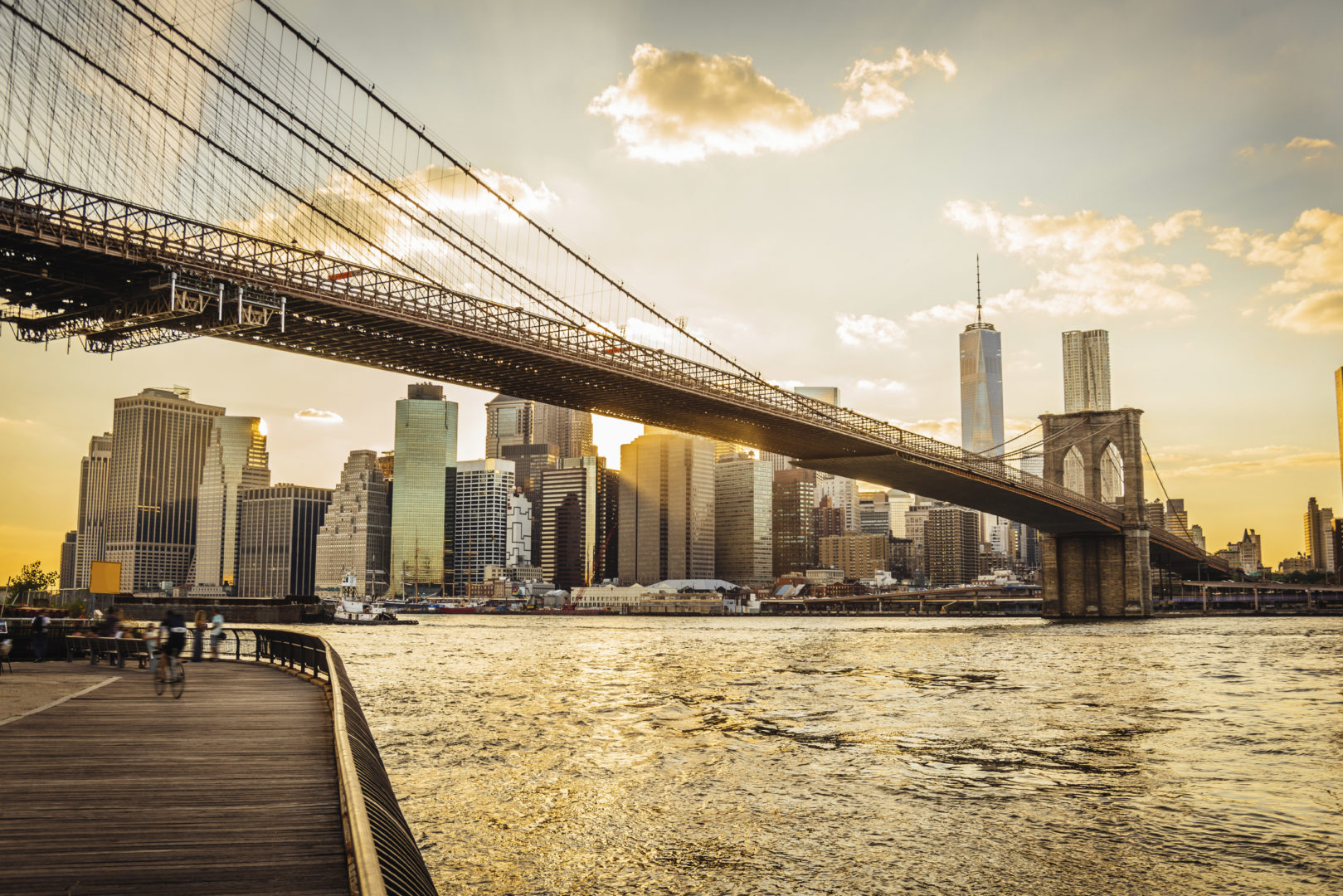 Moody image of Brooklyn bridge and Manhattan skyline
